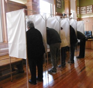 Voters cast their early ballot in Westfield City Council chambers (WNG file photo)