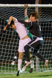 It was a fierce battle out in front of both nets all night in the Westfield-Longmeadow boys' soccer tournament game Tuesday. The Bombers fell 3-2. (Photo by Marc St. Onge)