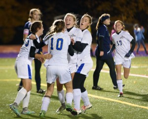 Gateway players celebrate the team's first goal from Taryn Kubik in a Division 4 West Sectional semifinal Wednesday night at Holyoke High School's Roberts Field. (Photo by Marc St. Onge)
