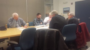 Members of the airport commission discuss. 