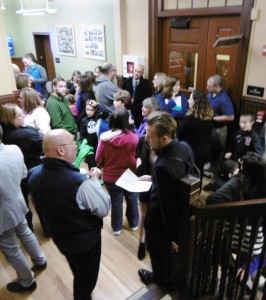Educators, parents and students gathered before the School Committee meeting on Monday. (Photo by Amy Porter)