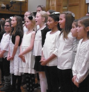 Fourth and fifth graders from Munger Hill elementary school sang to the School Committee Monday evening. (Photo by Amy Porter)