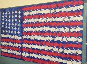 The American flag that Powder Mill and Woodland School students created, is made up of letters that they wrote to military veterans. (Photo by Greg Fitzpatrick)