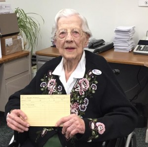 Florence Warriner holds up the card that shows she first registered to vote in Southwick in 1958. (Photo by Greg Fitzpatrick)