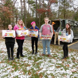 White Oak students deliver food donations to the Common Goods pantry at WSU on Monday. (Photo by Amy Porter)