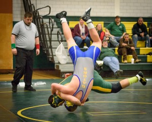 In a battle of 220 pounders, Southwick's Trevor Desruisseaux throws Gateway's Trevor Bruno to the mat. (Photo by Marc St. Onge)