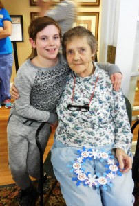 Fifth grader Allyssa Slack gave her wreath to her great-grandmother, Julie LaFogg. (Photo by Amy Porter)
