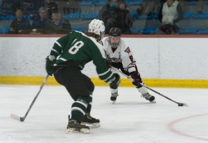 Westfield's Scotty Bussell (11) dodges the Minnechaug defense Saturday at Amelia Park Arena. (Photo by Lynn Boscher)