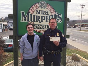 Granville Police Lieutenant Rick Rindels stands with Mrs. Murphy's employee Dane Markowski. (Photo by Greg Fitzpatrick)