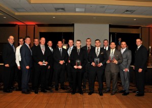 Members from the 104th Maintenance Group stand with their commanders and supervisors after receiving their group-level awards at the 104th Fighter Wing’s 43rd Annual Awards Banquet, Jan. 8, 2017, Sheraton Monarch Place Hotel, Springfield, Mass. Nearly 400 members from Barnes Air National Guard Base gathered together to honor the hard work, dedication, and sacrifice of the men and women of the 104th Fighter Wing. (U.S. Air National Guard photo by Tech. Sgt. Lindsey Sarah Watson-Kirwin.)