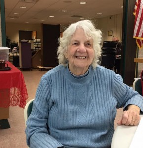 Anne Mountain, a regular at the Southwick Senior Center, enjoys her Thursday morning in the senior center dining hall. (Photo by Greg Fitzpatrick)