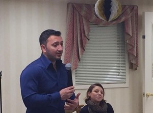 Guest speaker Mohammed Najeeb speaks to the crowd about refugee resettlement. (Photo by Greg Fitzpatrick)