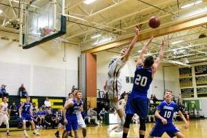 Southwick's Nick Hough tips the ball away from a Granby player Friday night. (Photo by Bill Deren)