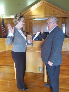 Westfield City Clerk Karen Fanion (l) administers the oath of office to John Beltrandi III (r) in City Council Chambers. (WNG file photo)