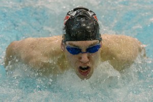 Westfield's Nicholas Rosso competes in the 100 yard butterfly Saturday during the Division 1 West Sectional swimming and diving championships at Springfield College. (Photo by Marc St. Onge)