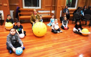 Third grade students from HIghland elementary school wait with their teacher Yelena Alekseyevets to give a presentation on the solar system to the School Committee on Monday. 