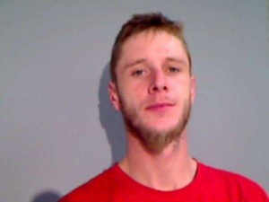 Kyle Mitchell was arrested on 12 counts of felony burglary . (Photo from Suffield Police Department)