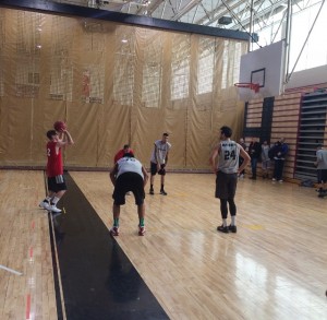 Action takes place in the local adult men's basketball league. (Photo by Devin Bates)