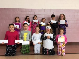 Franklin Avenue students from all grade levels show off their pjs and donations for a good cause. (Submitted photo)