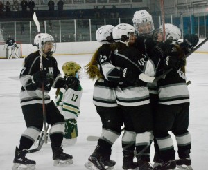 No. 12 Longmeadow (WHS Co-Op) celebrates an early lead against fifth-seeded Matignon in Division 2 girls' hockey tournament action Saturday. (Photo by Chris Putz)
