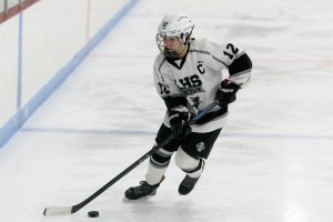 Longmeadow girls' ice hockey's Madison Pelletier, of Westfield, controls the puck during a regular season contest. (File photo by Bill Deren)