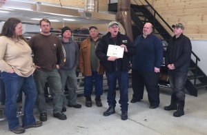 Lebeaux presents a certificate to Maple Corner Farm for their participation in Maple Weekend. (Photo by Greg Fitzpatrick)