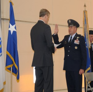 Gov. Charlie Baker swears in Col. James M. Suhr Sunday. Photo provided by Tech Sgt. Lindsey Watson-Kirwin