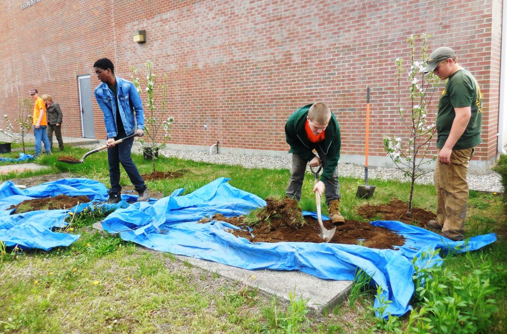 Horticulture Tech students plant trees with third graders at Munger ...