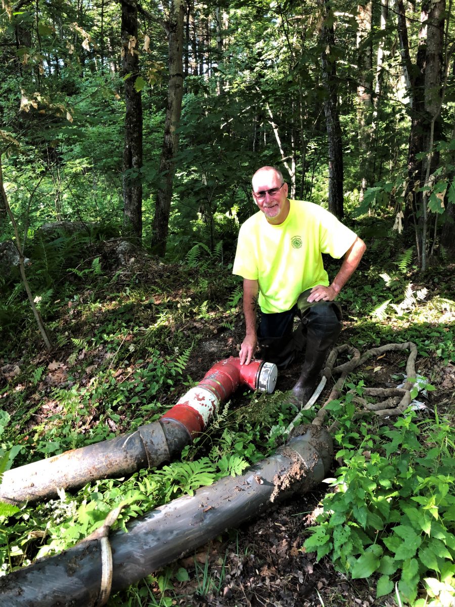 Mongtomery FIre Capt Mark Chretien with old dry hydrant after removal